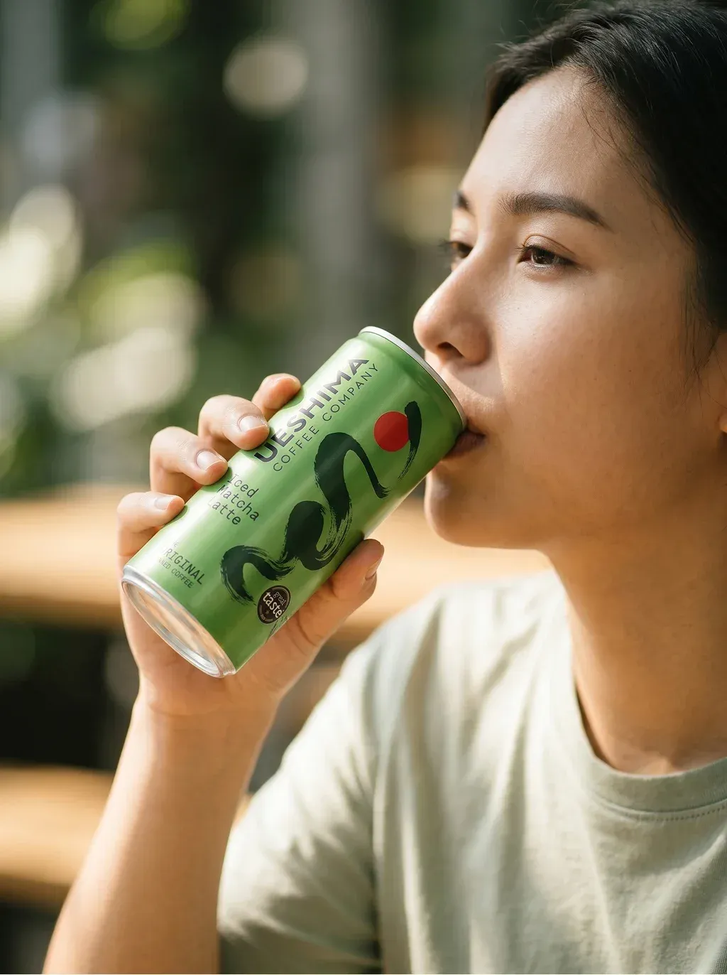 Lifestyle portrait of a young Asian woman in a light