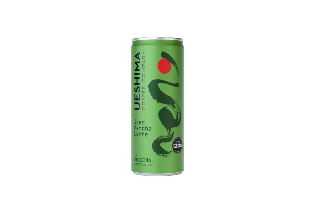 Dynamic action shot of a Ueshima Iced Matcha Latte can — reference image