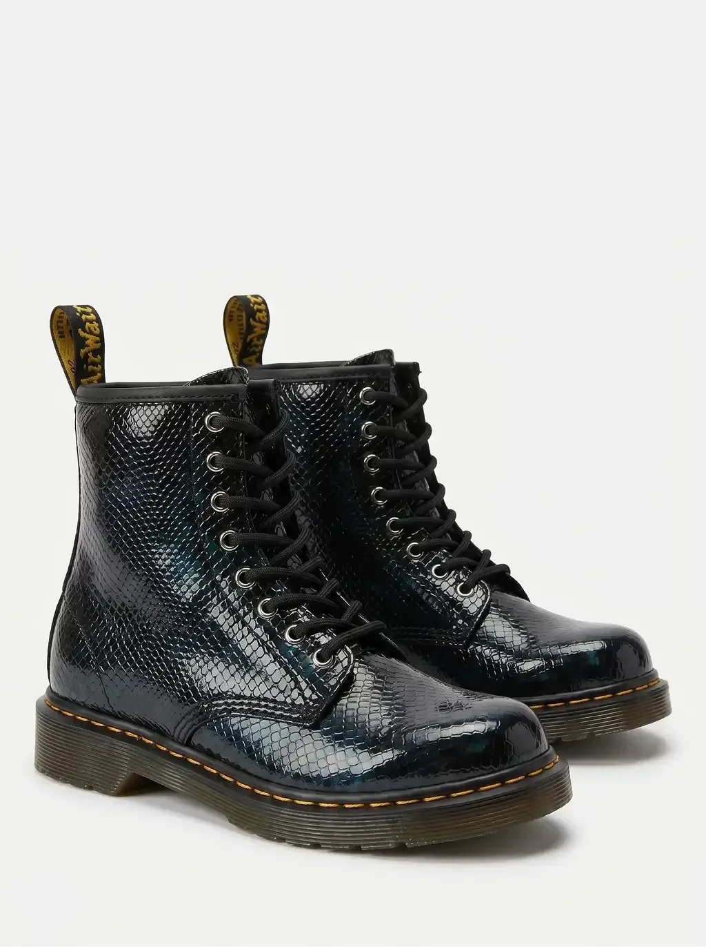 Three-quarter angle product photography of a pair of 8-eyelet lace-up