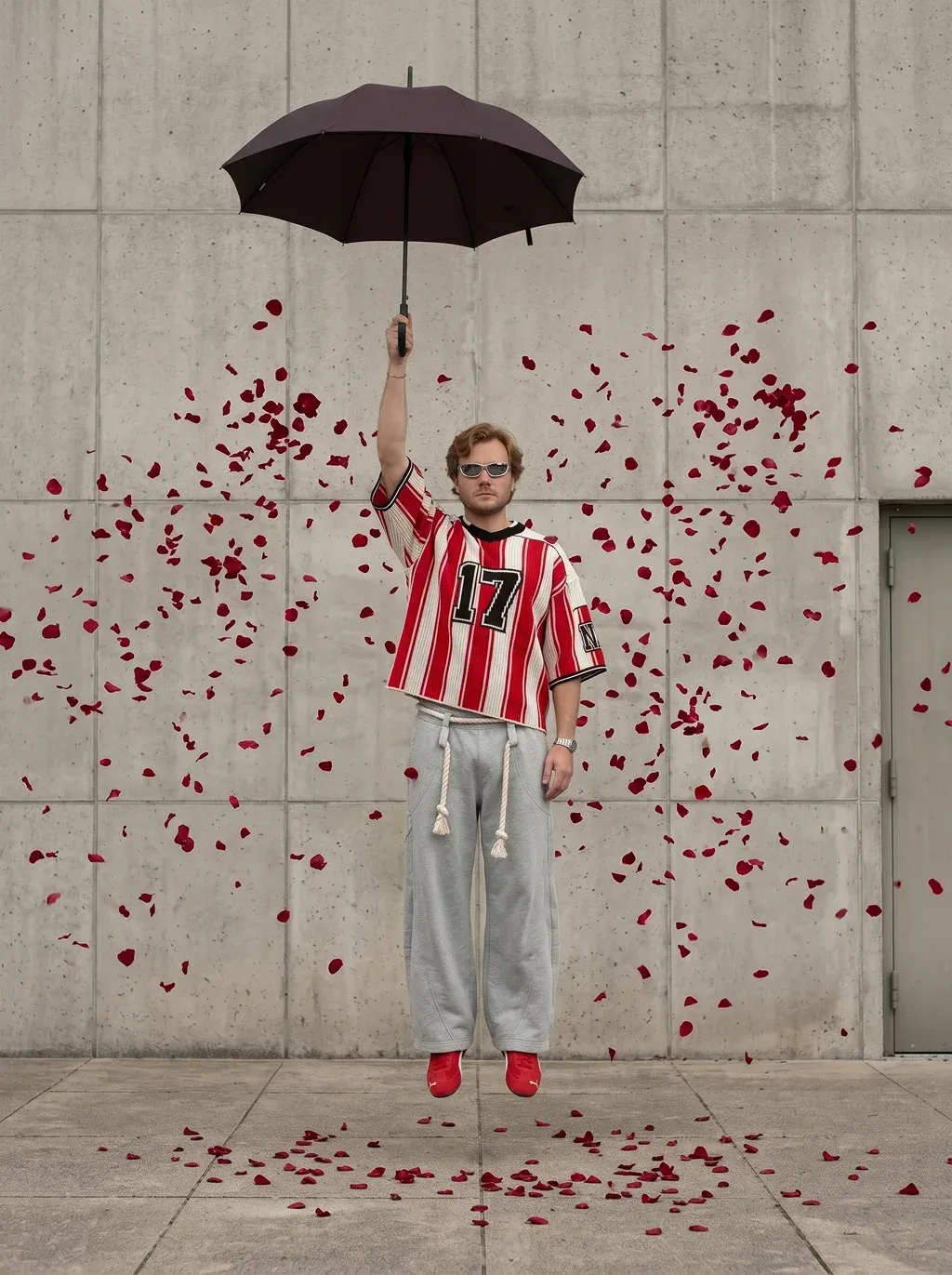 Surreal documentary photography of a young man with reddish-blond hair