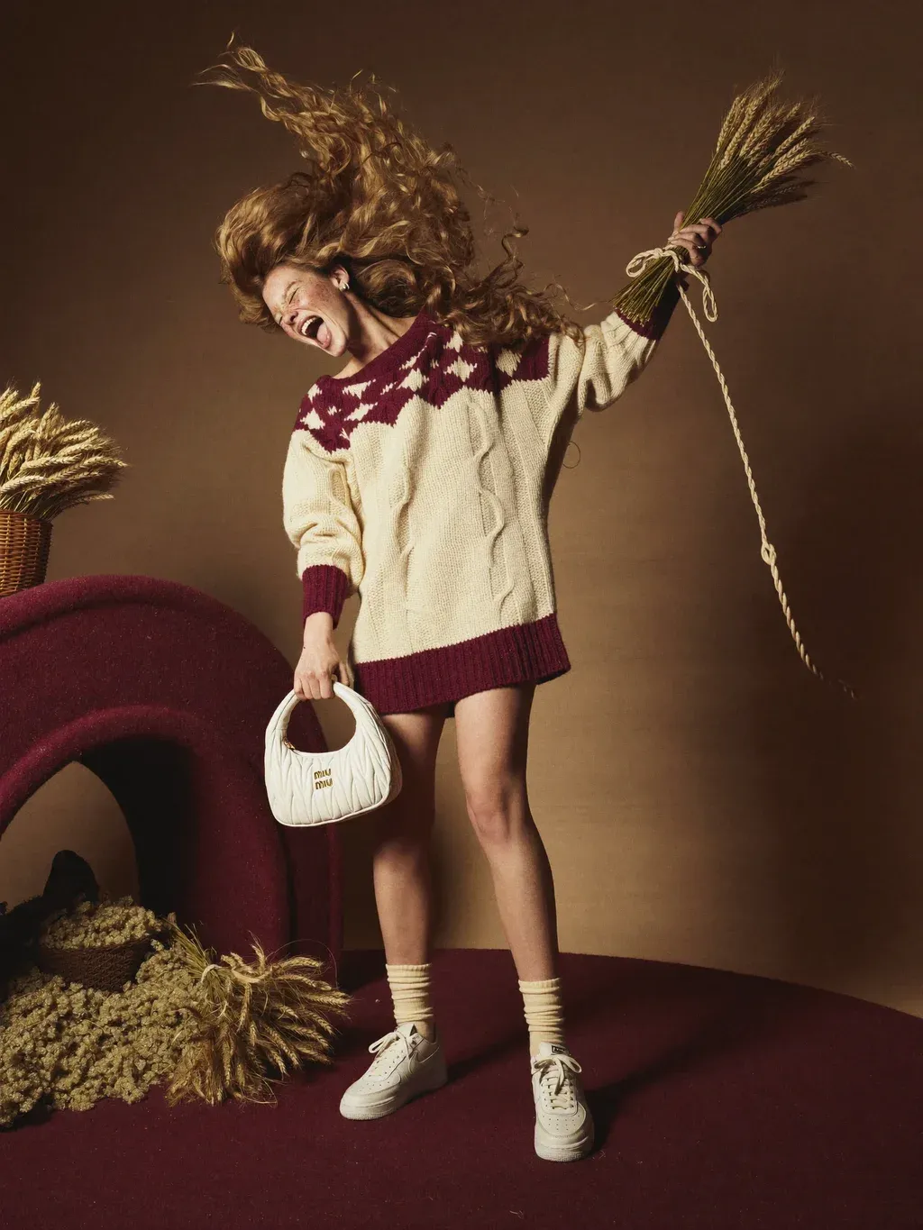 Surreal editorial fashion photograph of a young woman with long