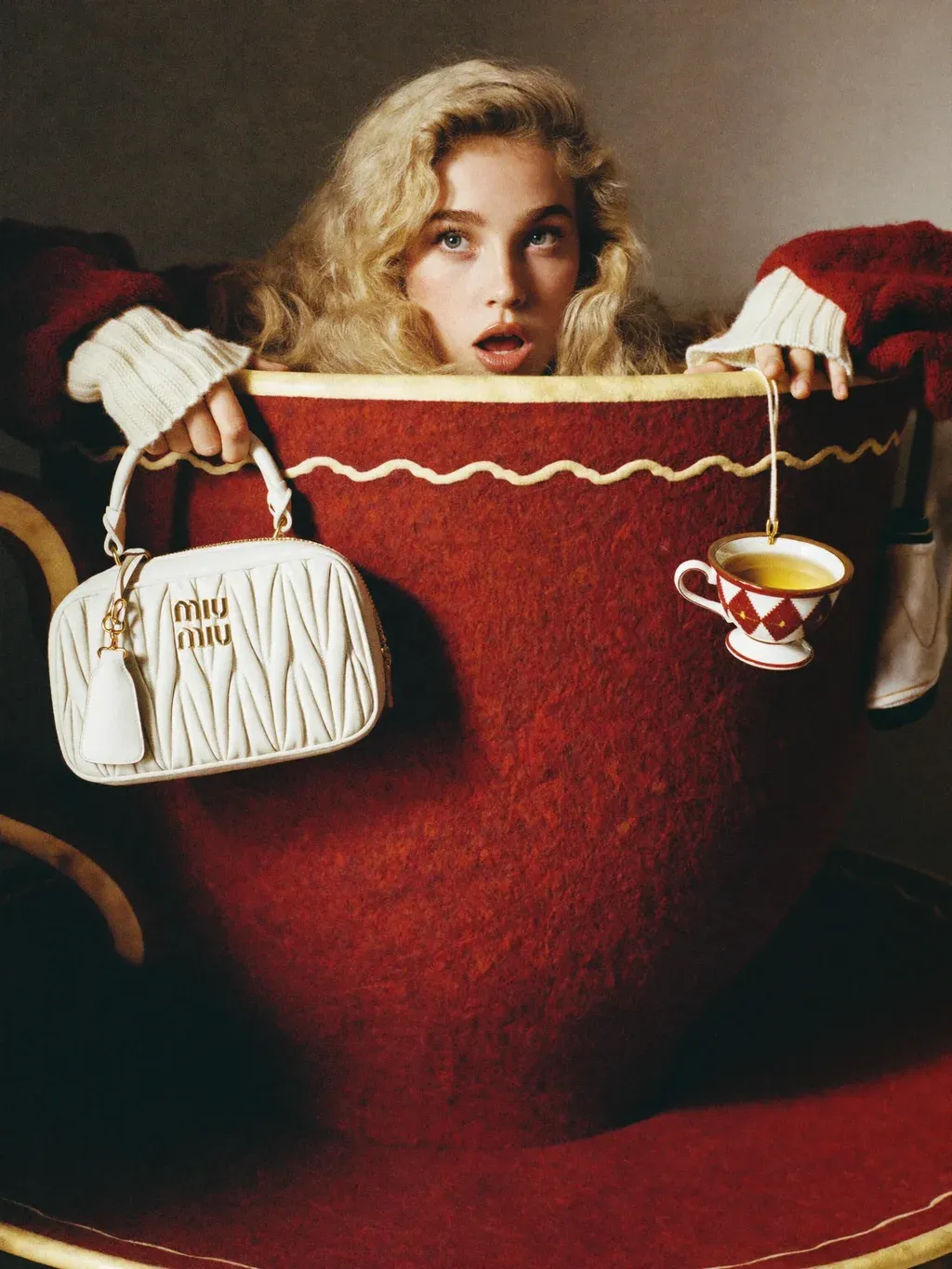 Surreal editorial fashion photograph of a young woman with long