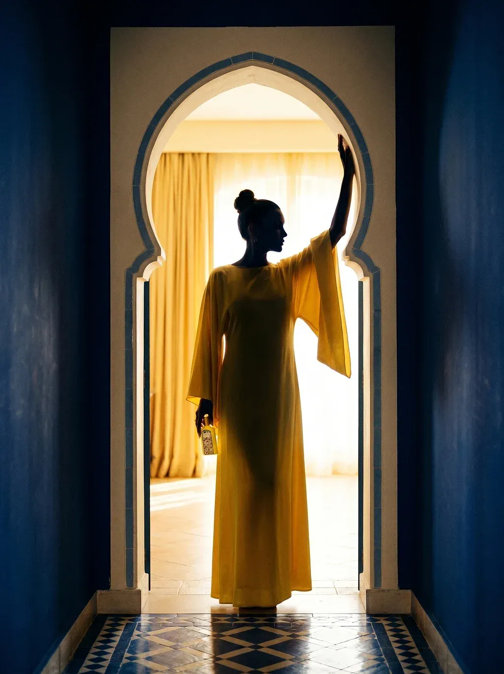 Cinematic editorial campaign silhouette photograph of a tall elegant woman