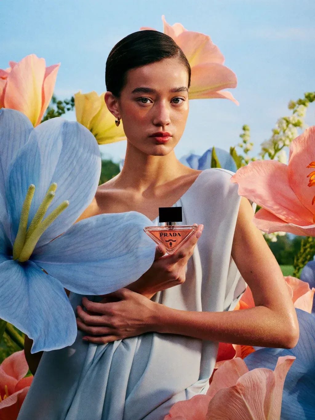 Editorial beauty campaign photograph of a young woman with slicked-back