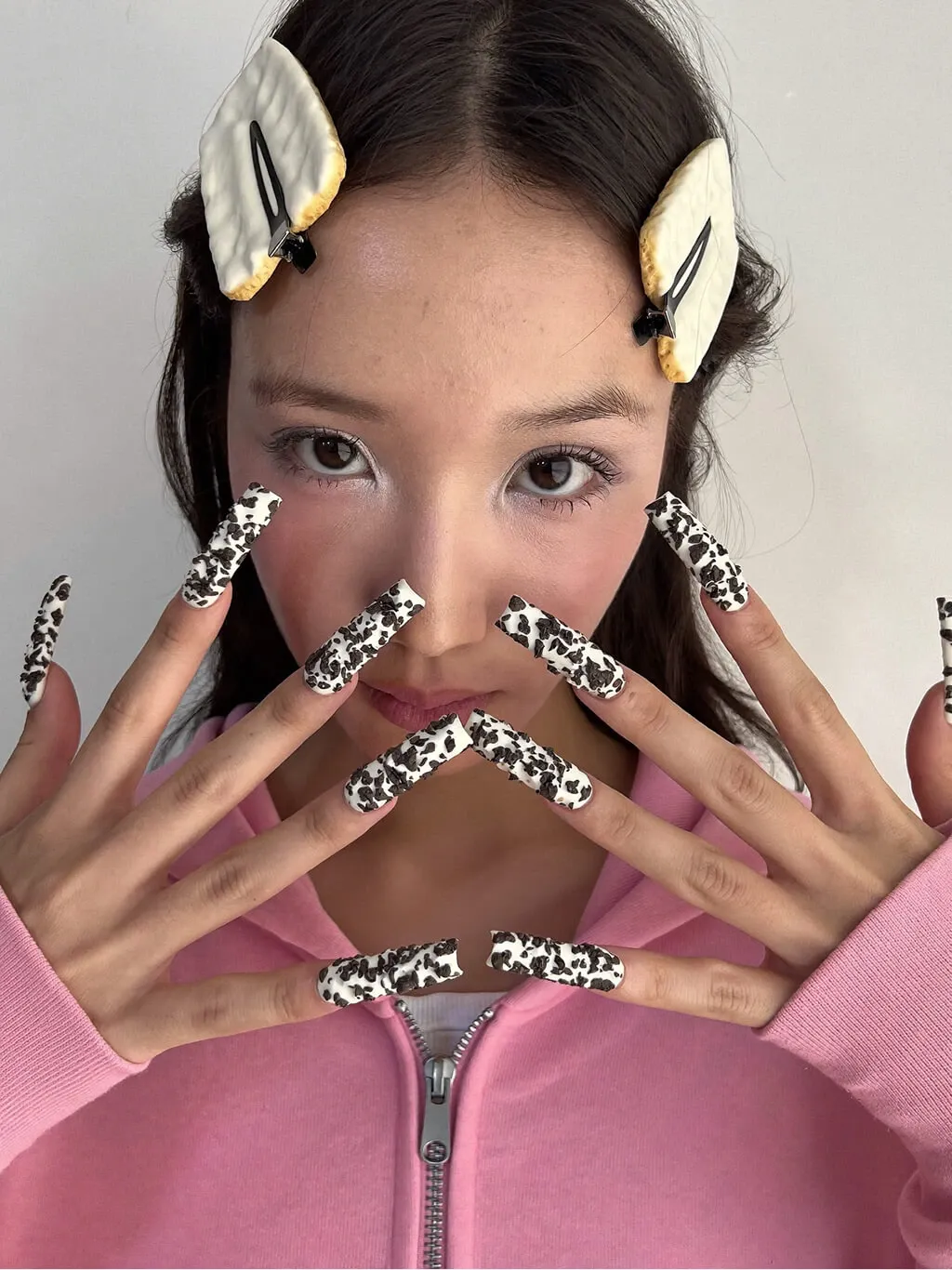 A fashion editorial close-up portrait of a young Asian woman
