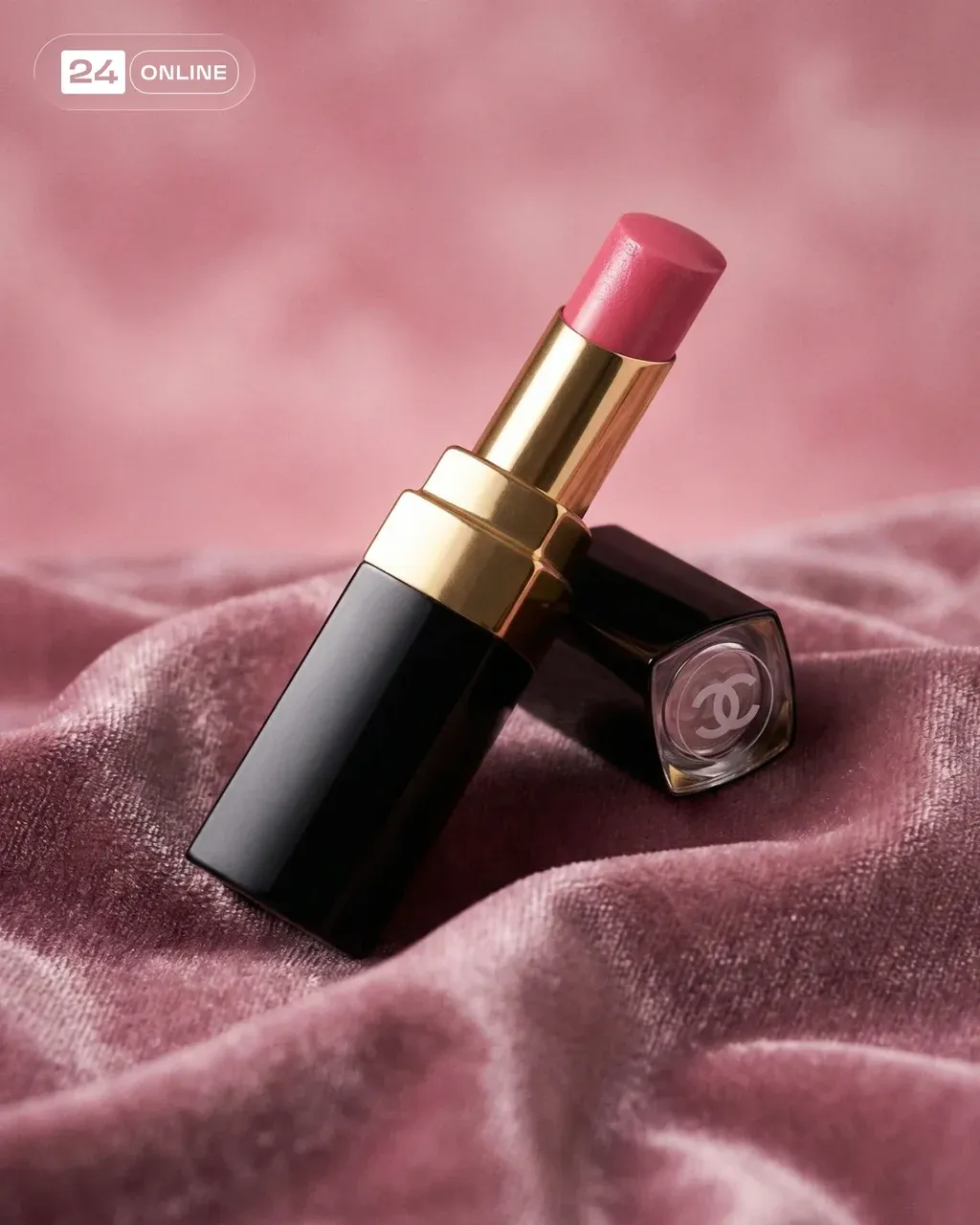 Beauty product photography of a pink lipstick in black and