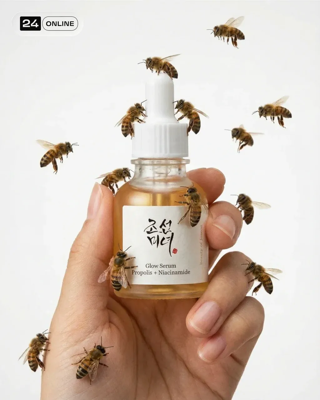 A sleek 10ml luxury serum bottle labeled YOUR BRAND, held