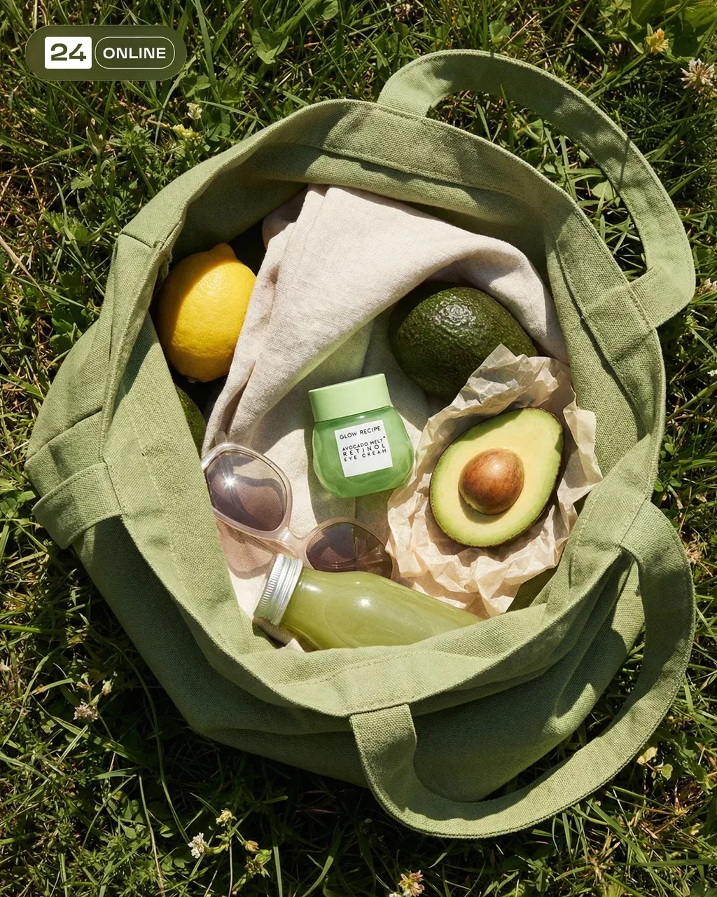 Hyper-realistic overhead product flatlay of an open olive green canvas