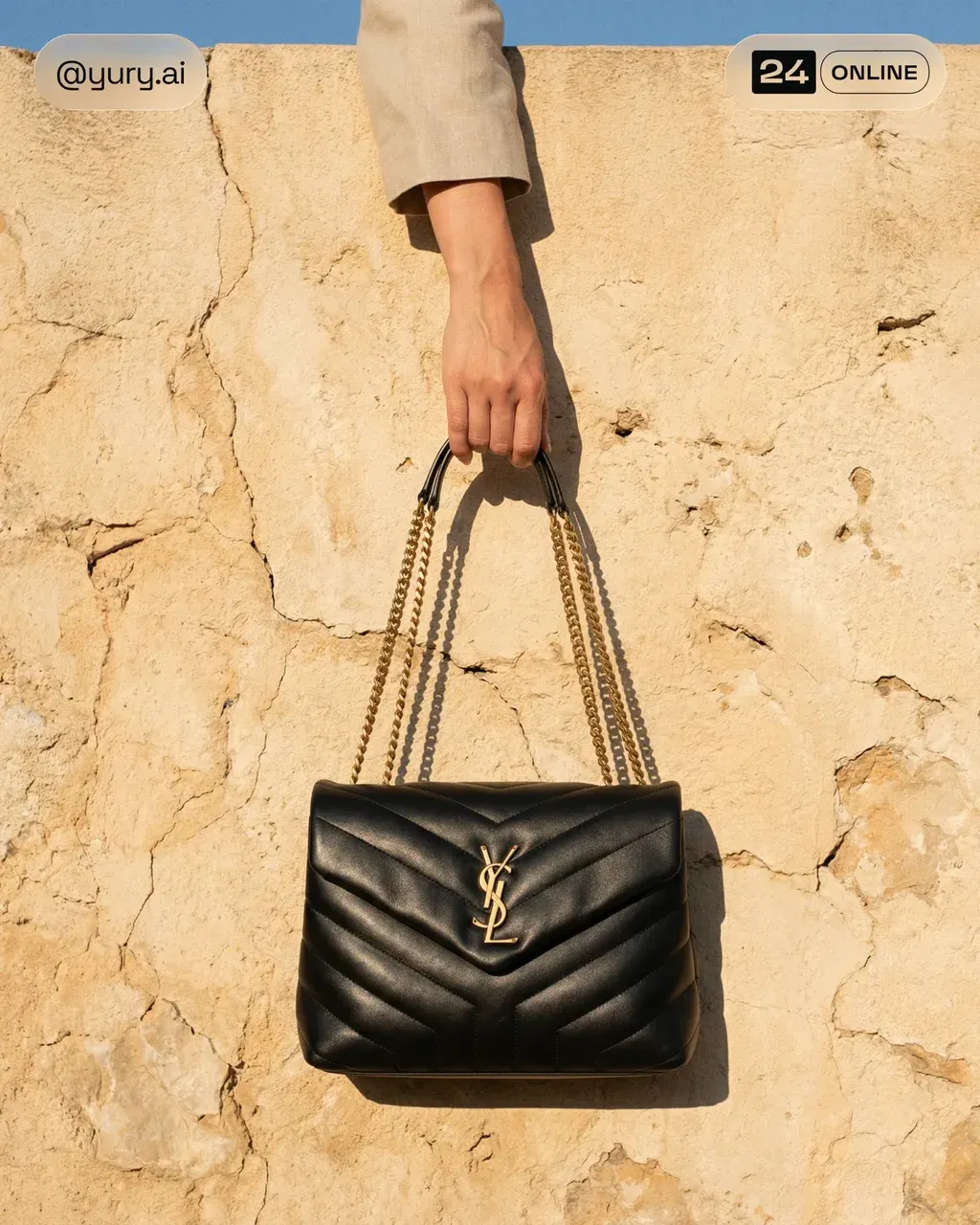 Minimalist luxury fashion photograph of a quilted black leather handbag