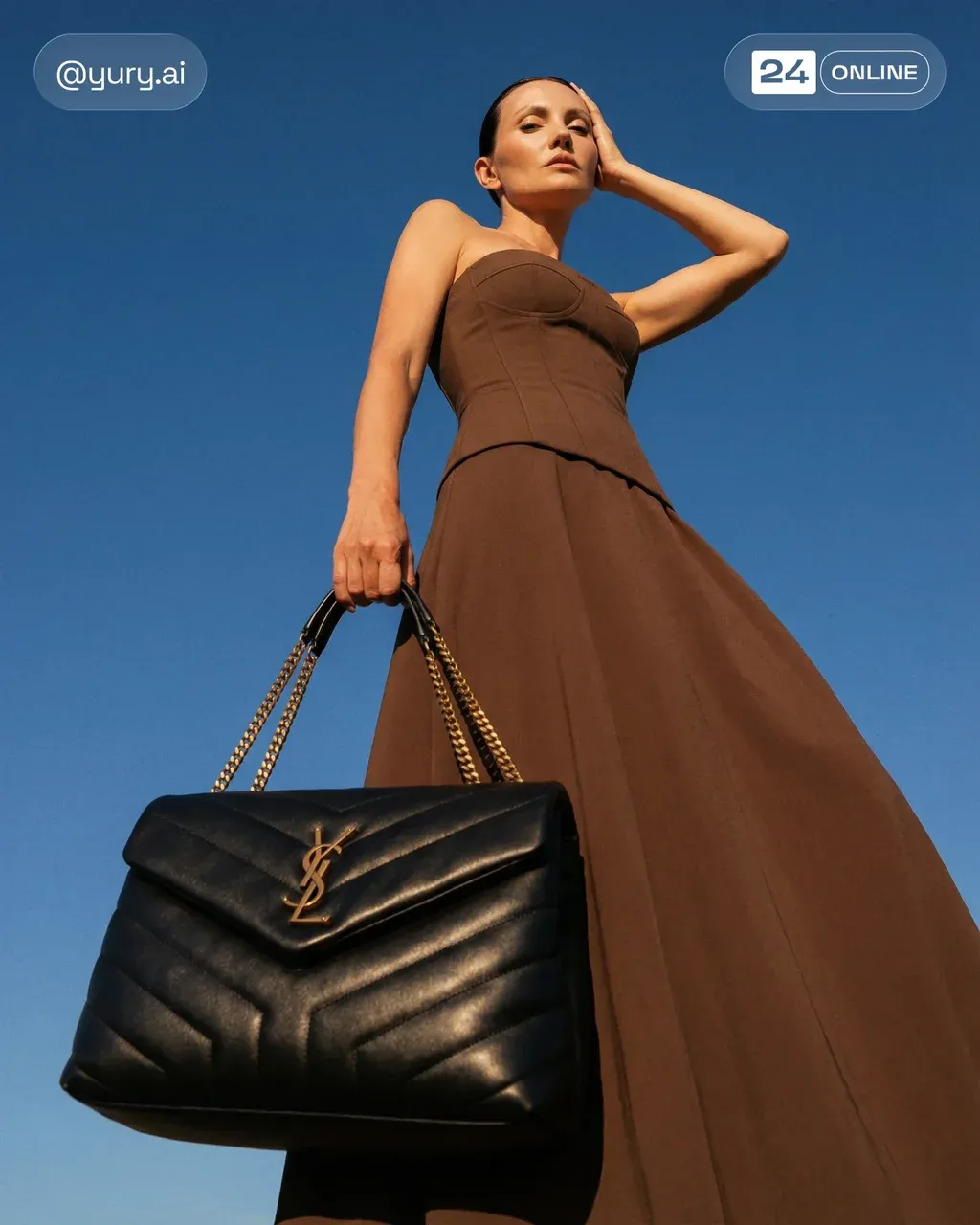 Low-angle luxury fashion photograph of a female model wearing a
