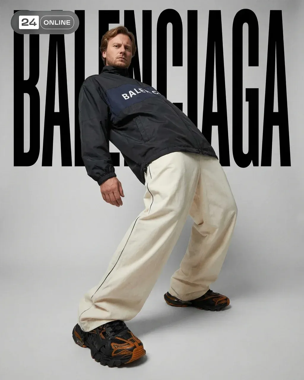 Hyper-realistic luxury streetwear campaign photo of a man in his
