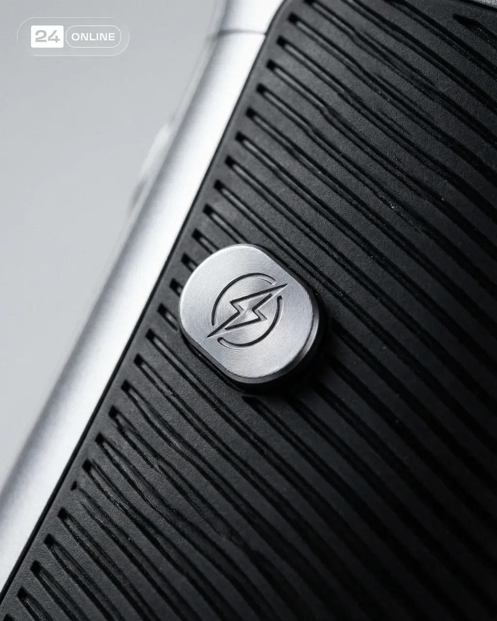 Macro industrial design photography of a textured black rubber grip