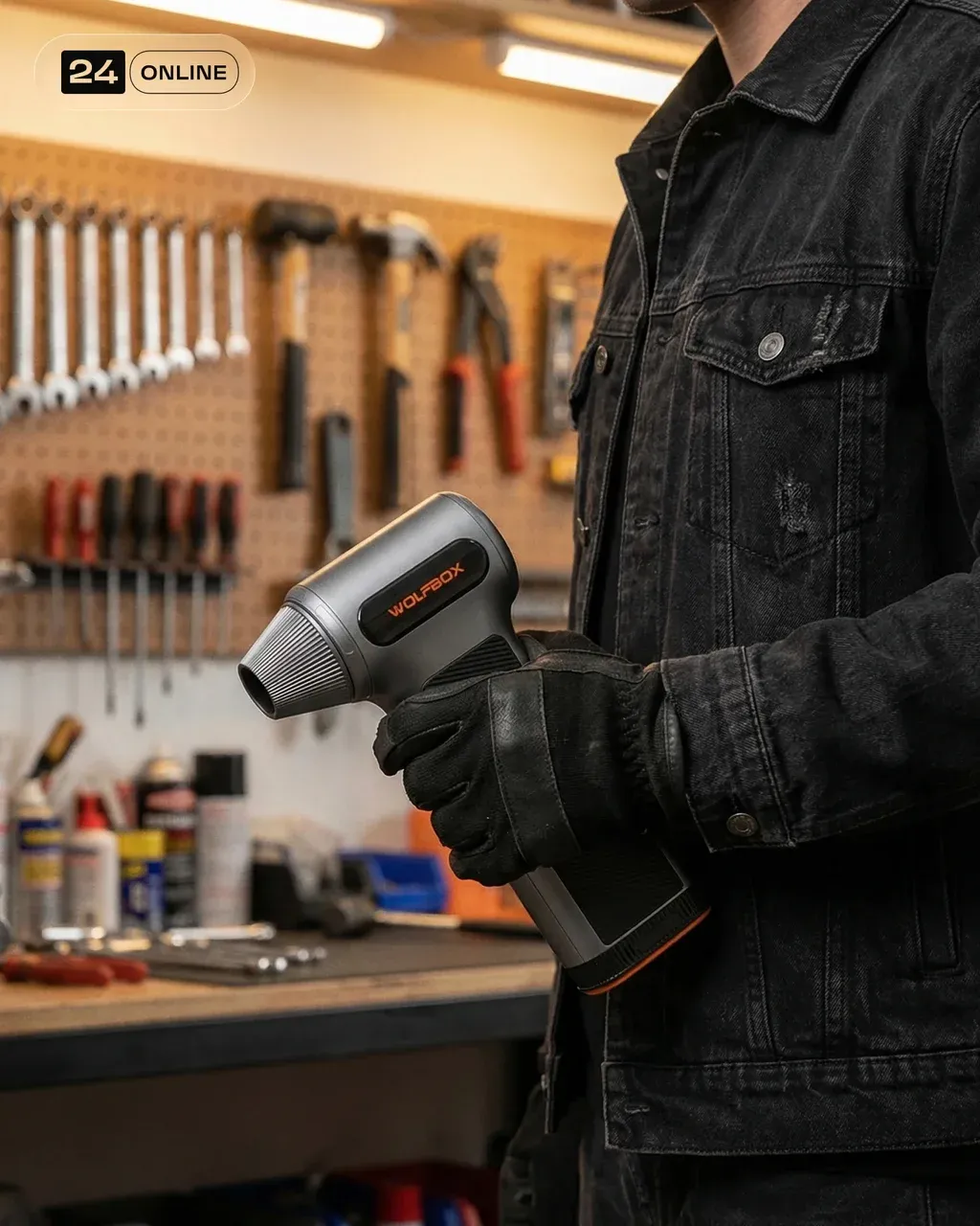 Lifestyle workshop photography of a mechanic wearing black work gloves