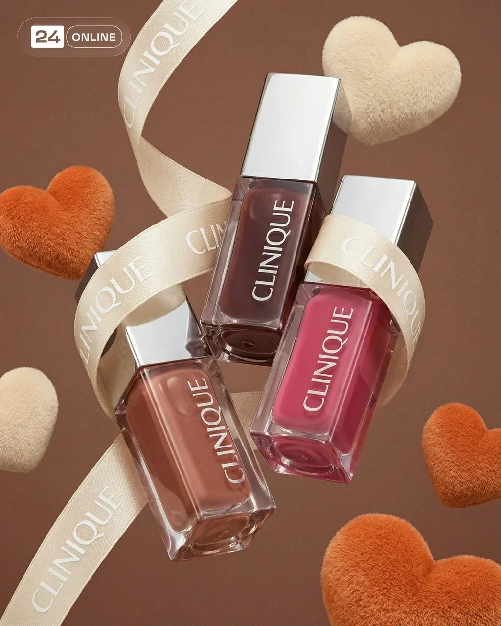 Luxury cosmetic product photography of three transparent glass lip gloss