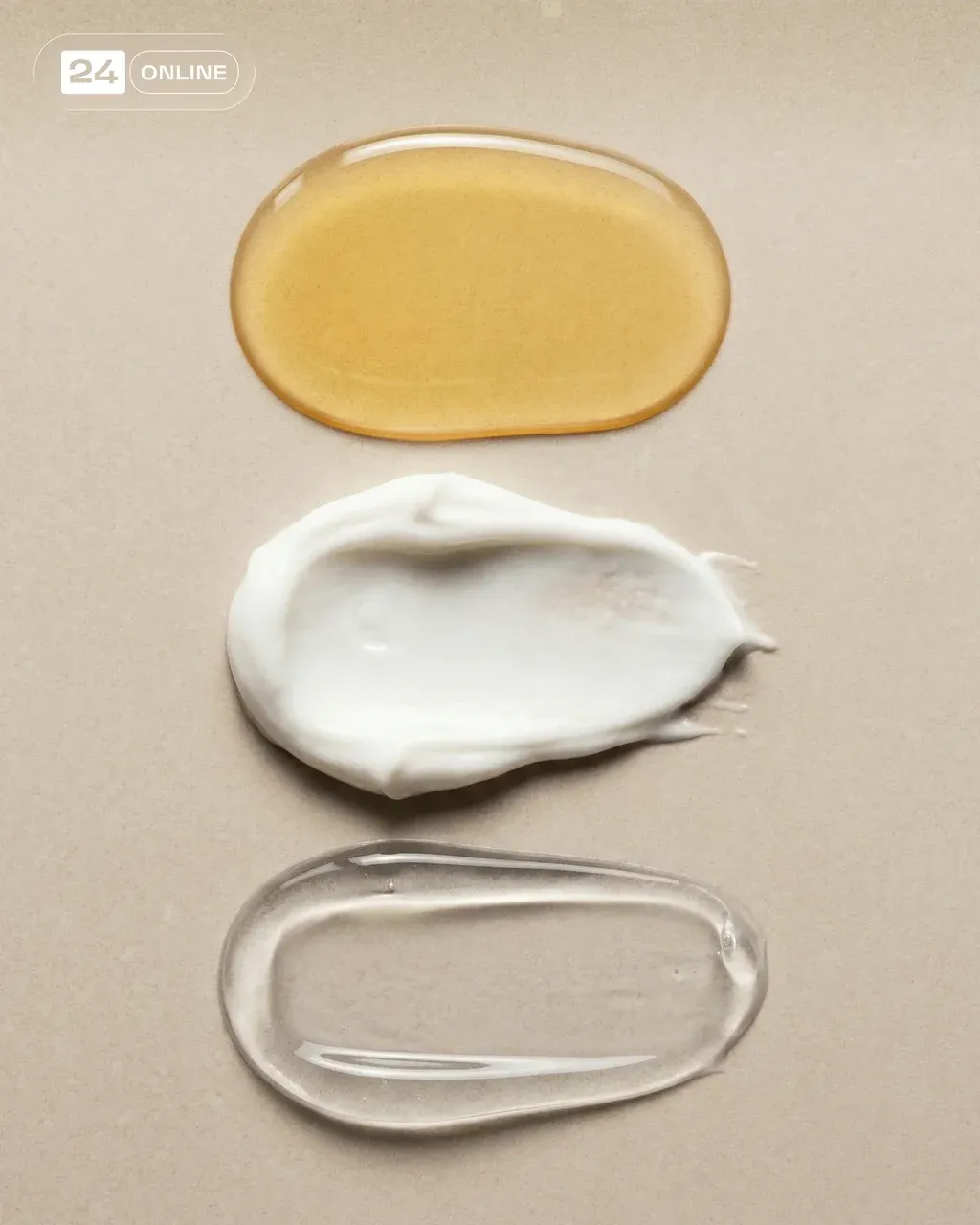 Minimalist macro beauty photography showing three cosmetic skincare texture swat…