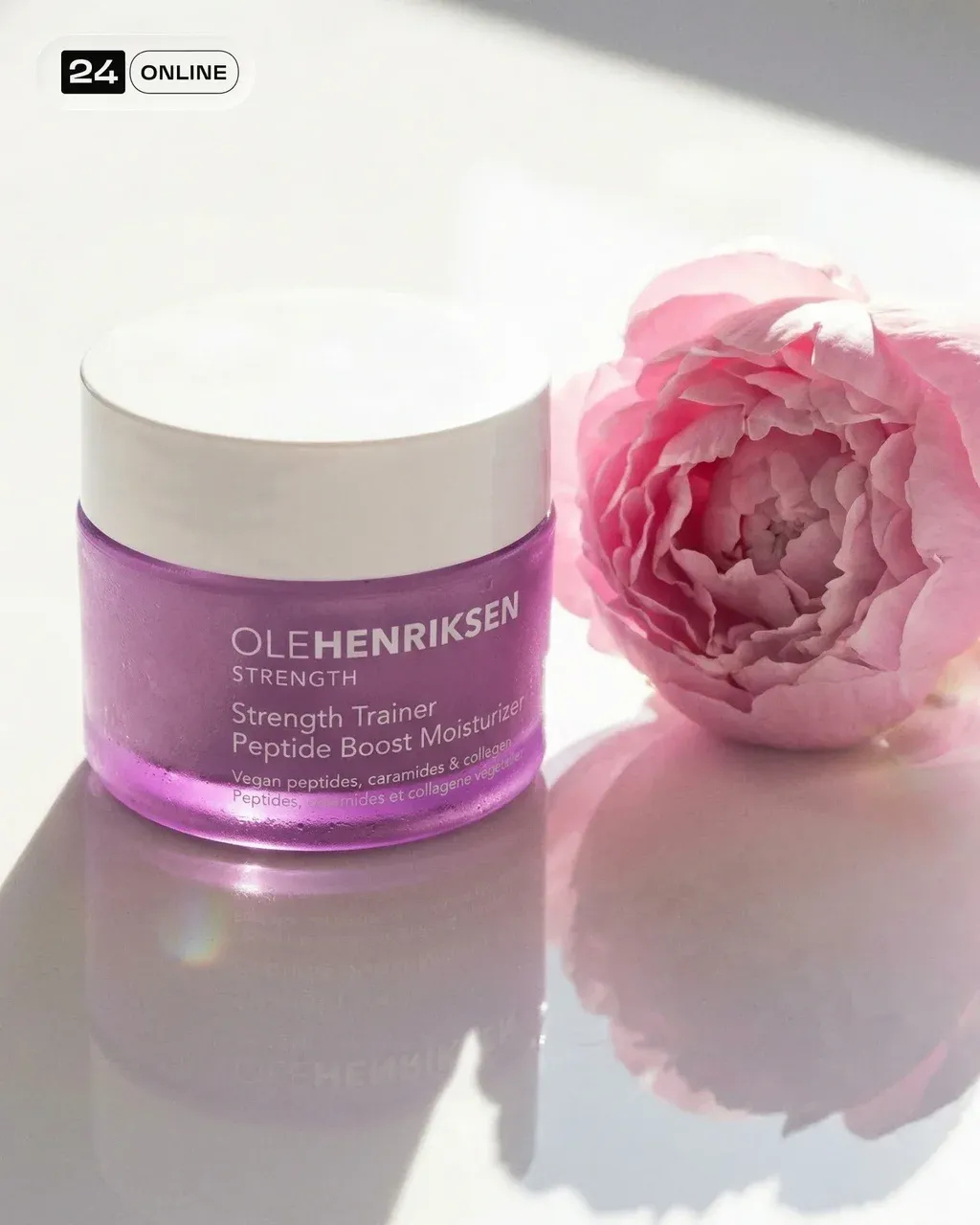 Luxury cosmetic product photography of INSERT PRODUCT moisturizer jar on