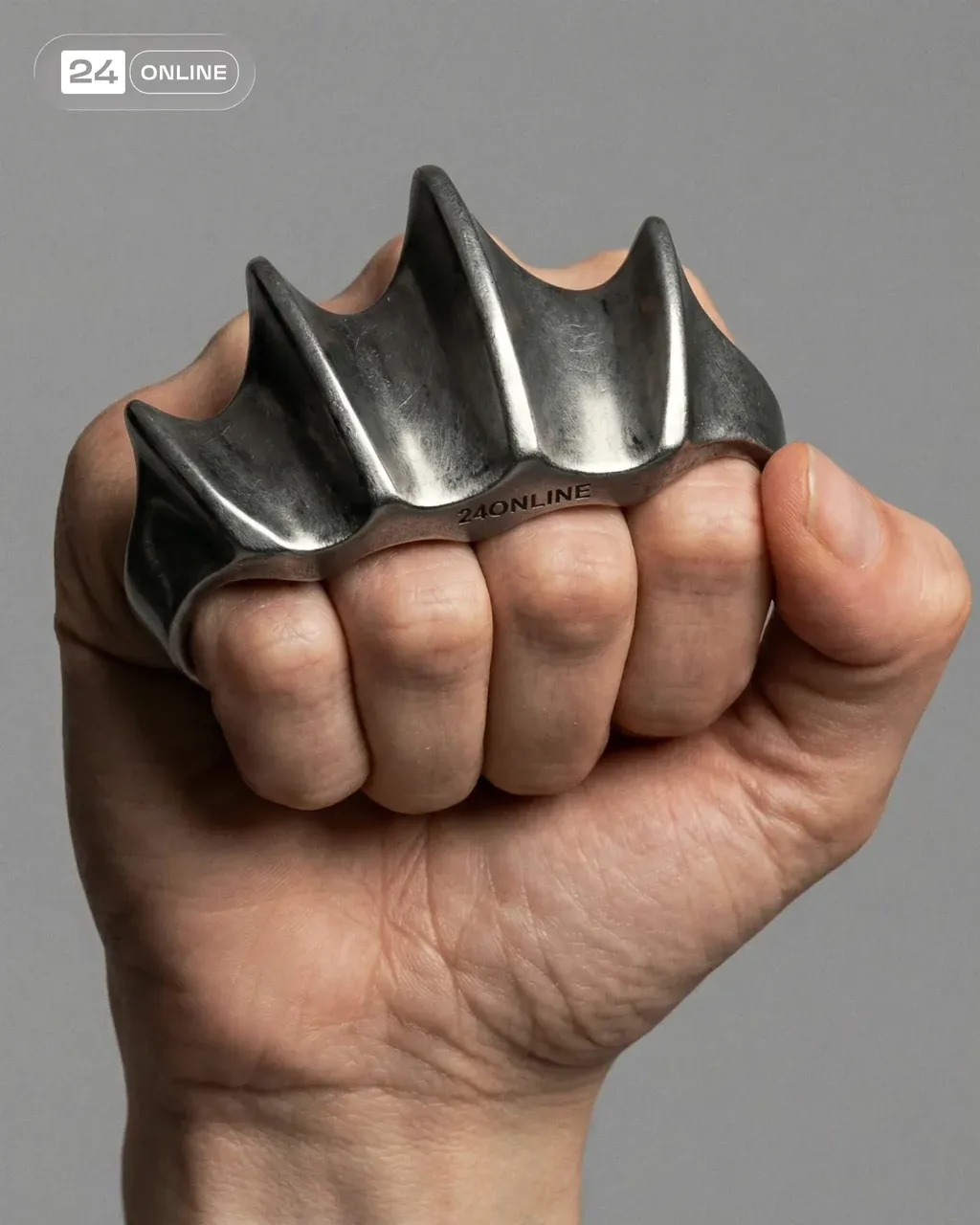 Hyper-realistic macro photo of a hand wearing a large brushed