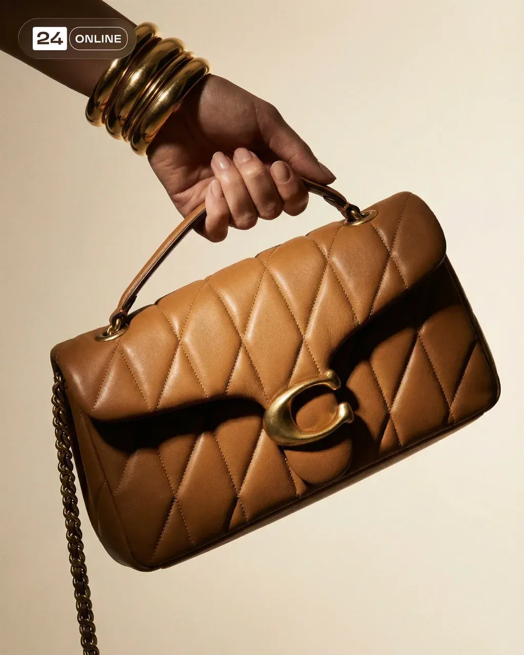 Ultra-luxury fashion campaign photograph of a beige and tan quilted
