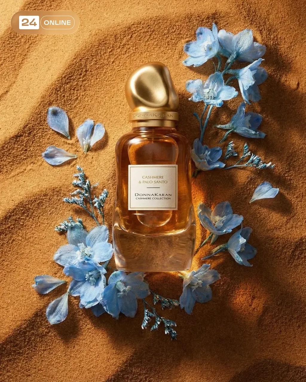 Top-down editorial product photography of a perfume bottle surrounded by