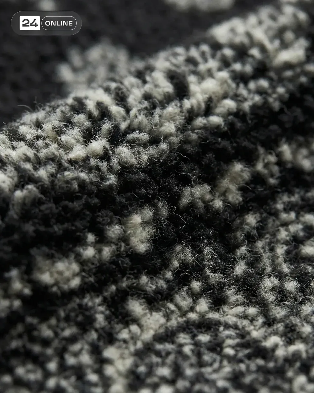 Ultra‑high magnification macro photograph of tailored wool fabric, attached jack…