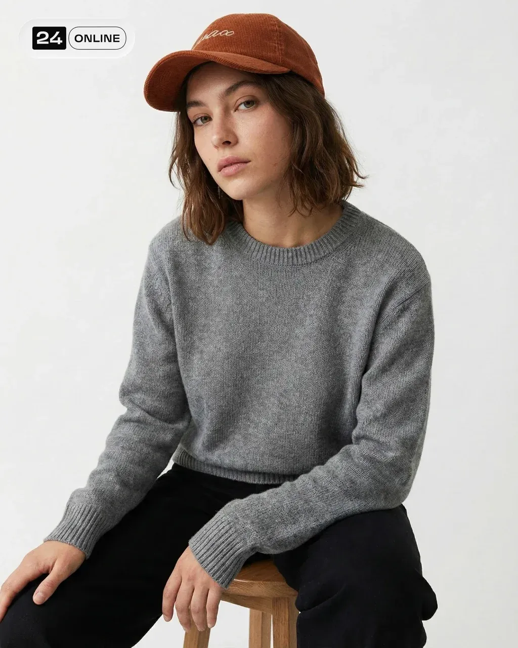 Minimalist editorial close-up studio portrait, full-body shot of a young