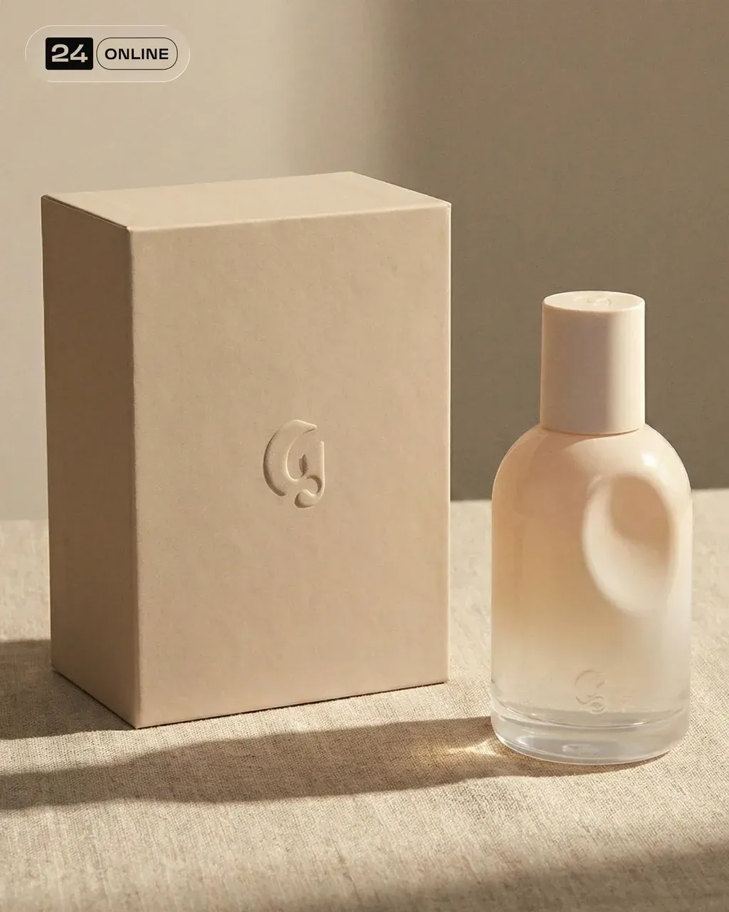 Luxury fragrance packaging shot featuring a matte beige perfume box