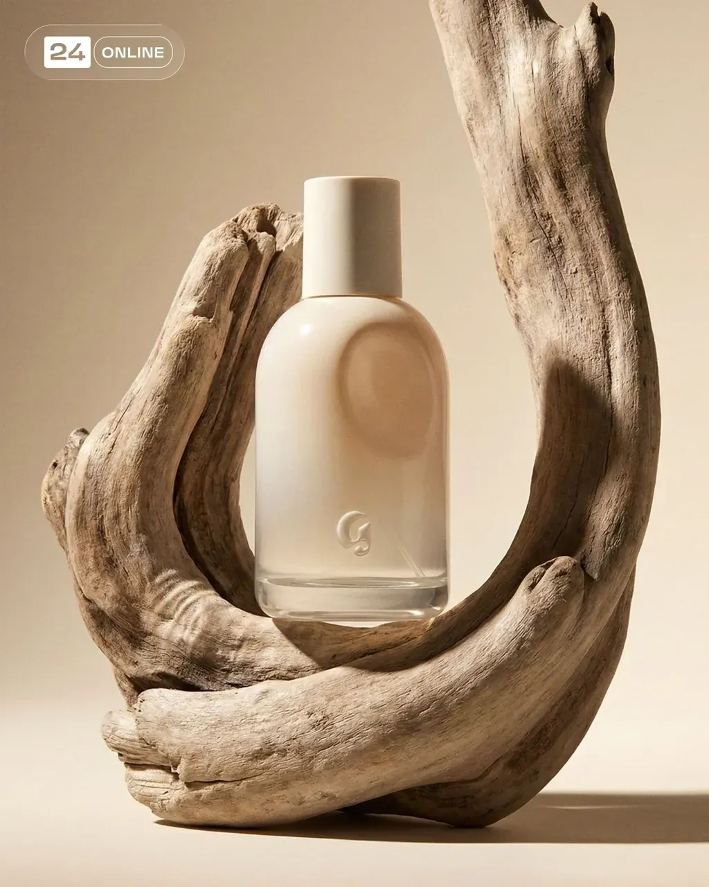 Premium editorial still-life of the PRODUCT perfume bottle on sculptural