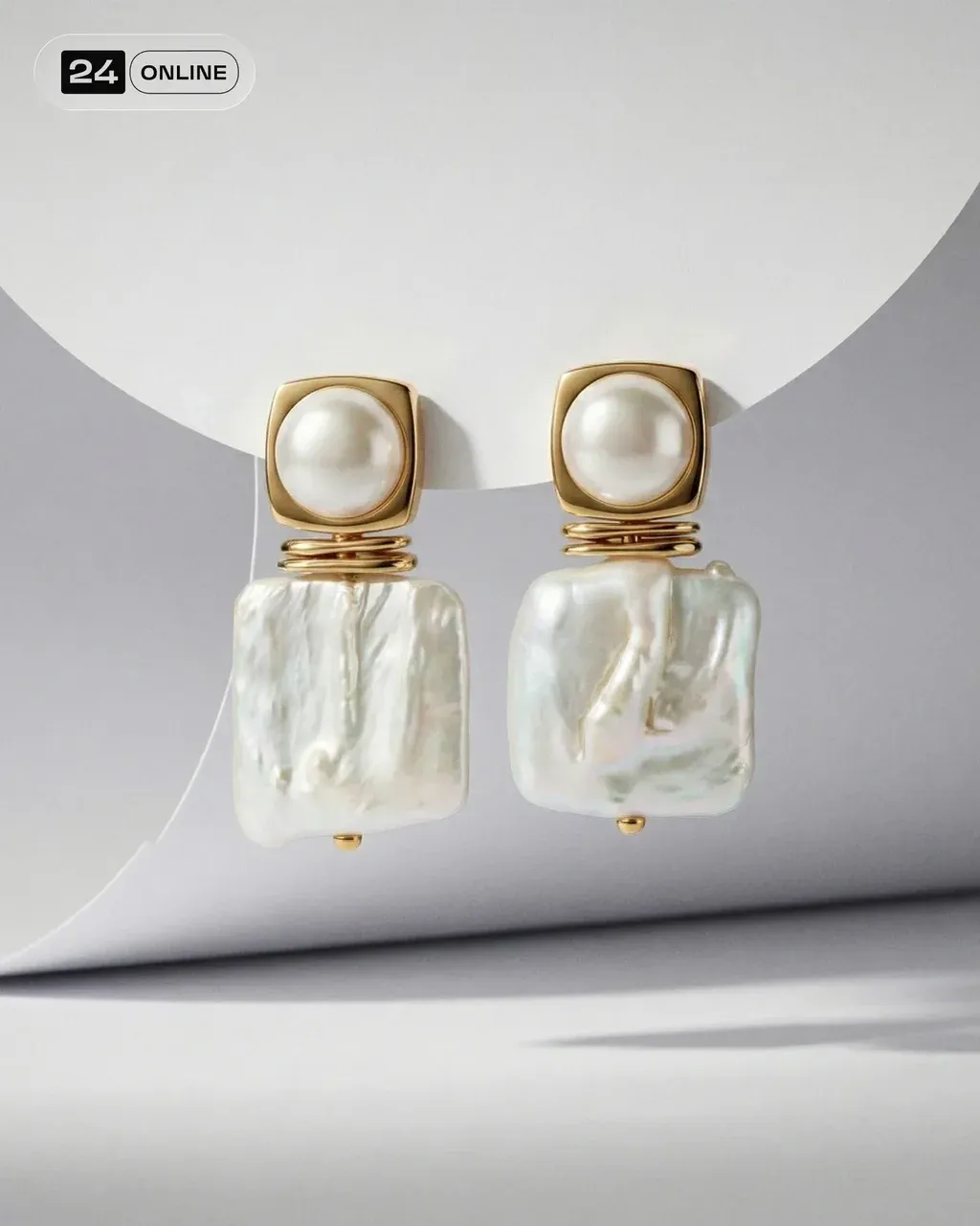 Ultra-high-end jewelry product photography. PRODUCT are hanging on a smooth