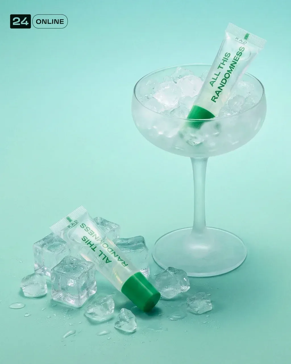 Minimalist wide square: frosted coupe with ice and lip gloss.