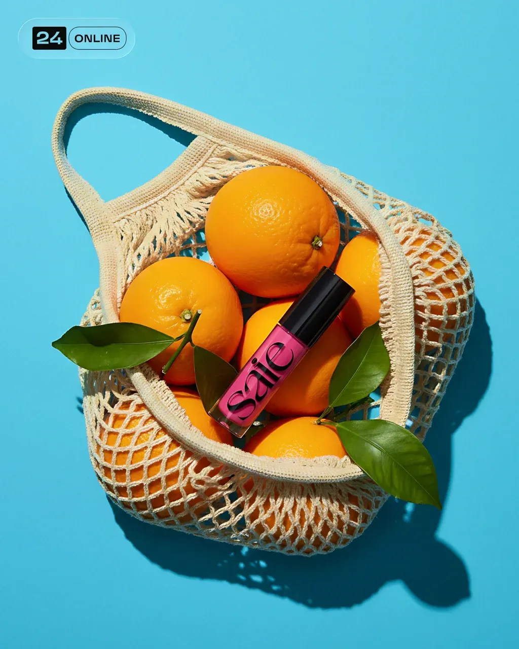 Place the PRODUCT nestled among fresh, bright oranges inside a