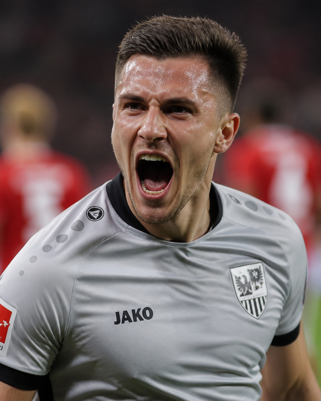 A professional soccer player celebrates a goal with an intense, wide-mouthed expression, …