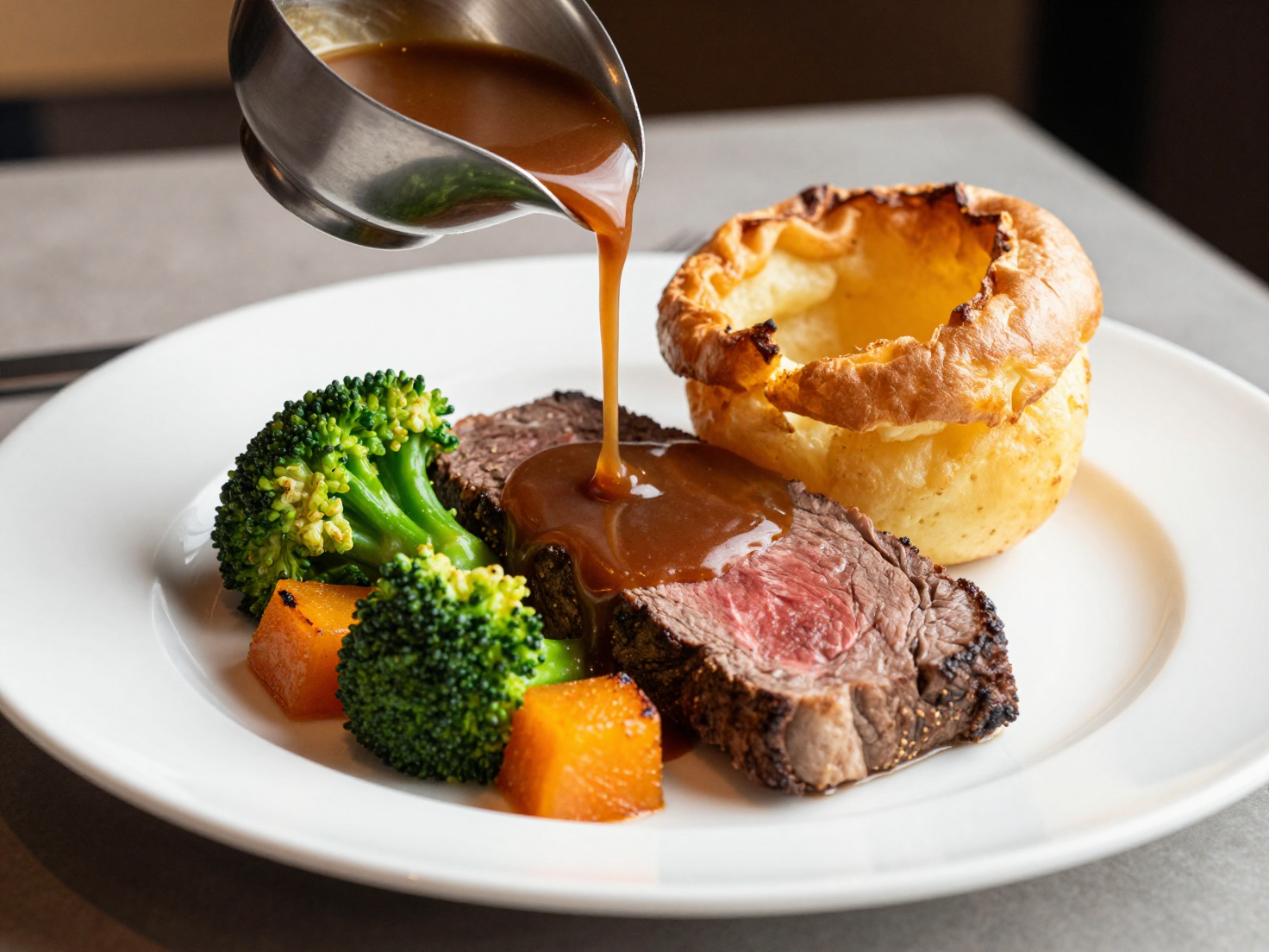 Professional food photography of a gourmet roast dinner served on a white ceramic plate. …