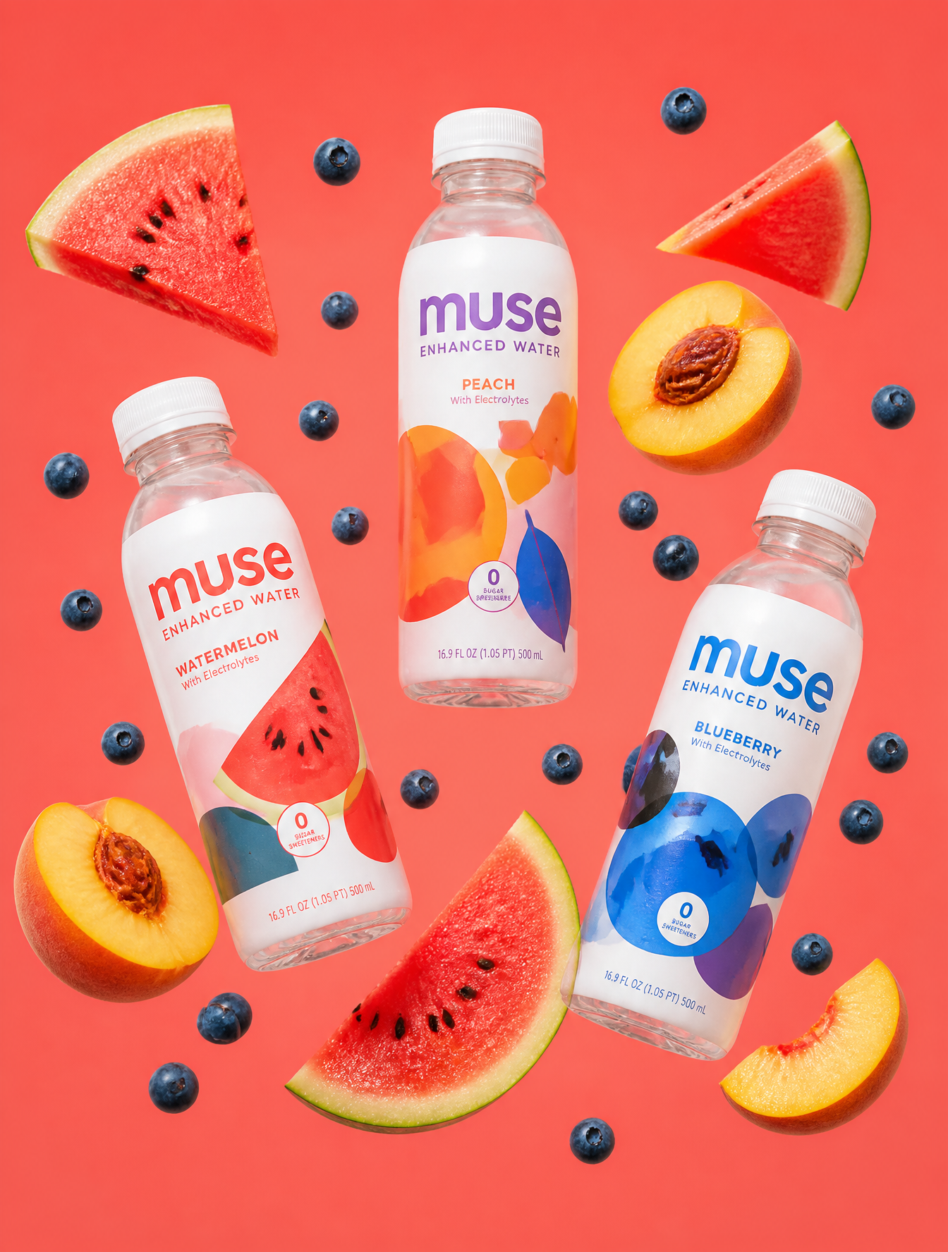 Three branded plastic bottles of Muse enhanced water are suspended in a weightless, gravi…
