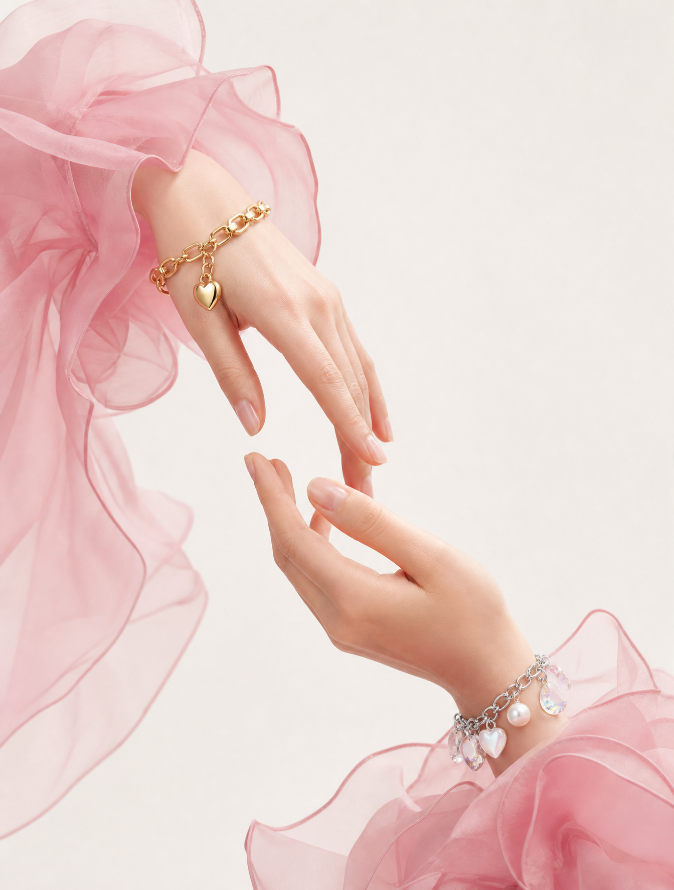 Two delicate hands reach toward each other in a graceful, symmetrical arrangement against…