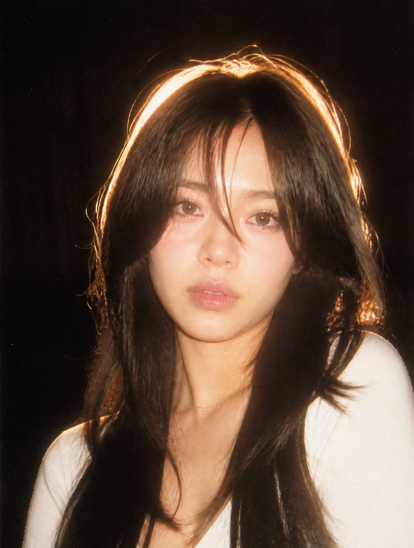 A nostalgic 90s film photography style portrait. Harsh direct camera flash lighting, stro…