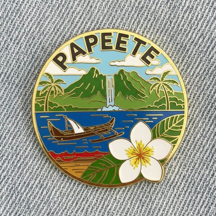 Close-up photo of a collectible enamel pin of [CITY], gold-plated metal edges, polished f…