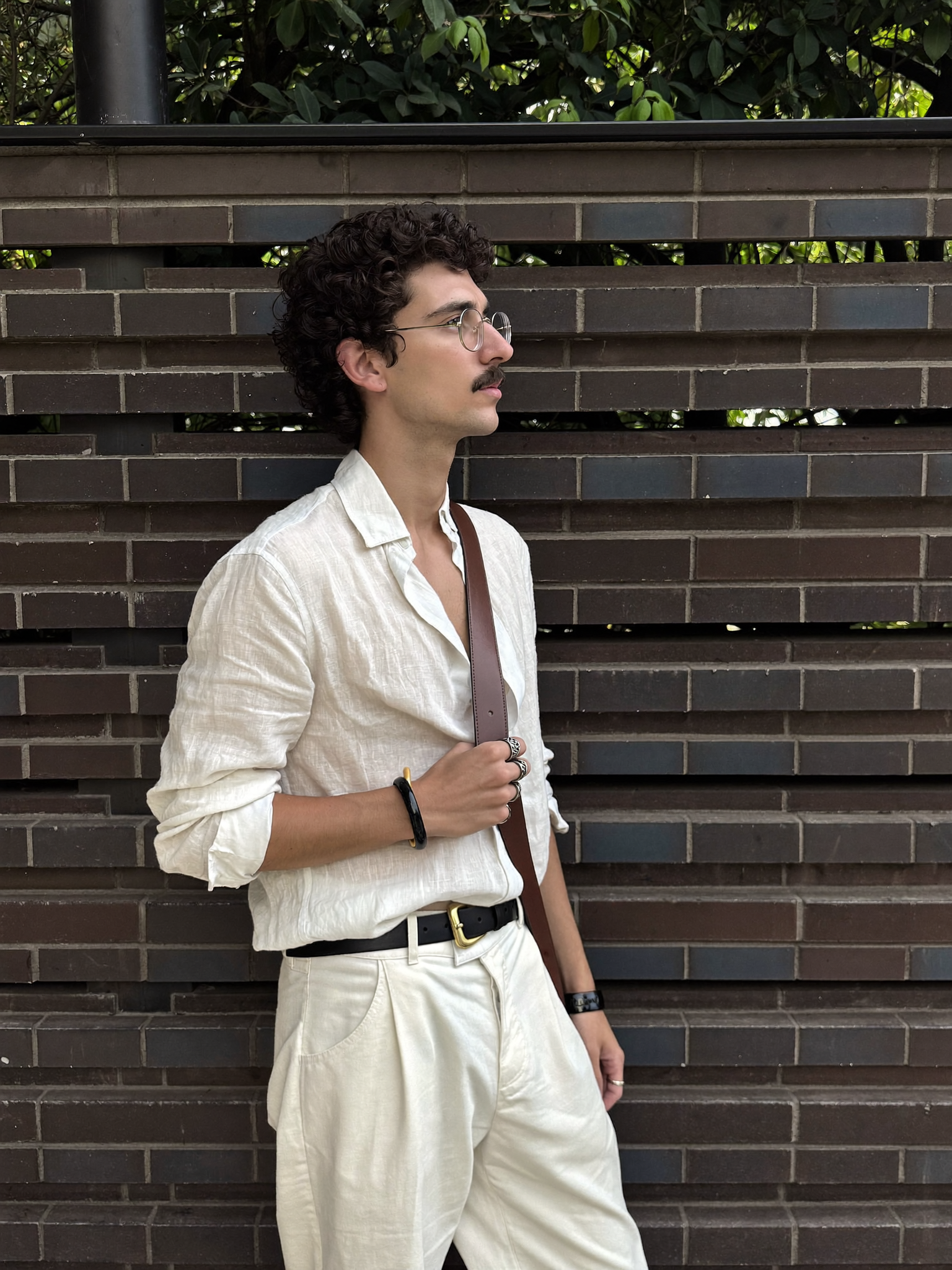 man in front of brickwall(80)