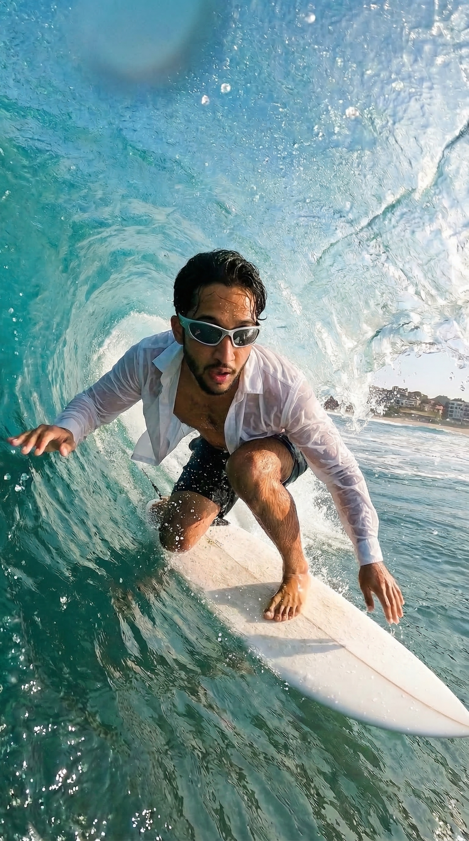 Surfer riding ocean wave